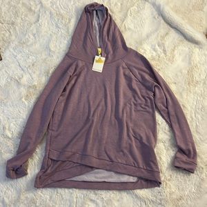 This is a really cute, lightweight sweatshirt really soft material. Size XXL.